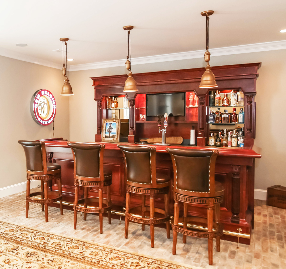 Traditional style fully-stocked bar in a newly remodeled home