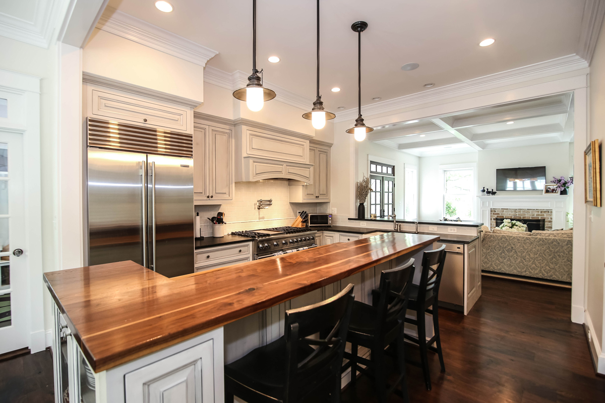 Open concept kitchen with island and state-of-the-art appliances