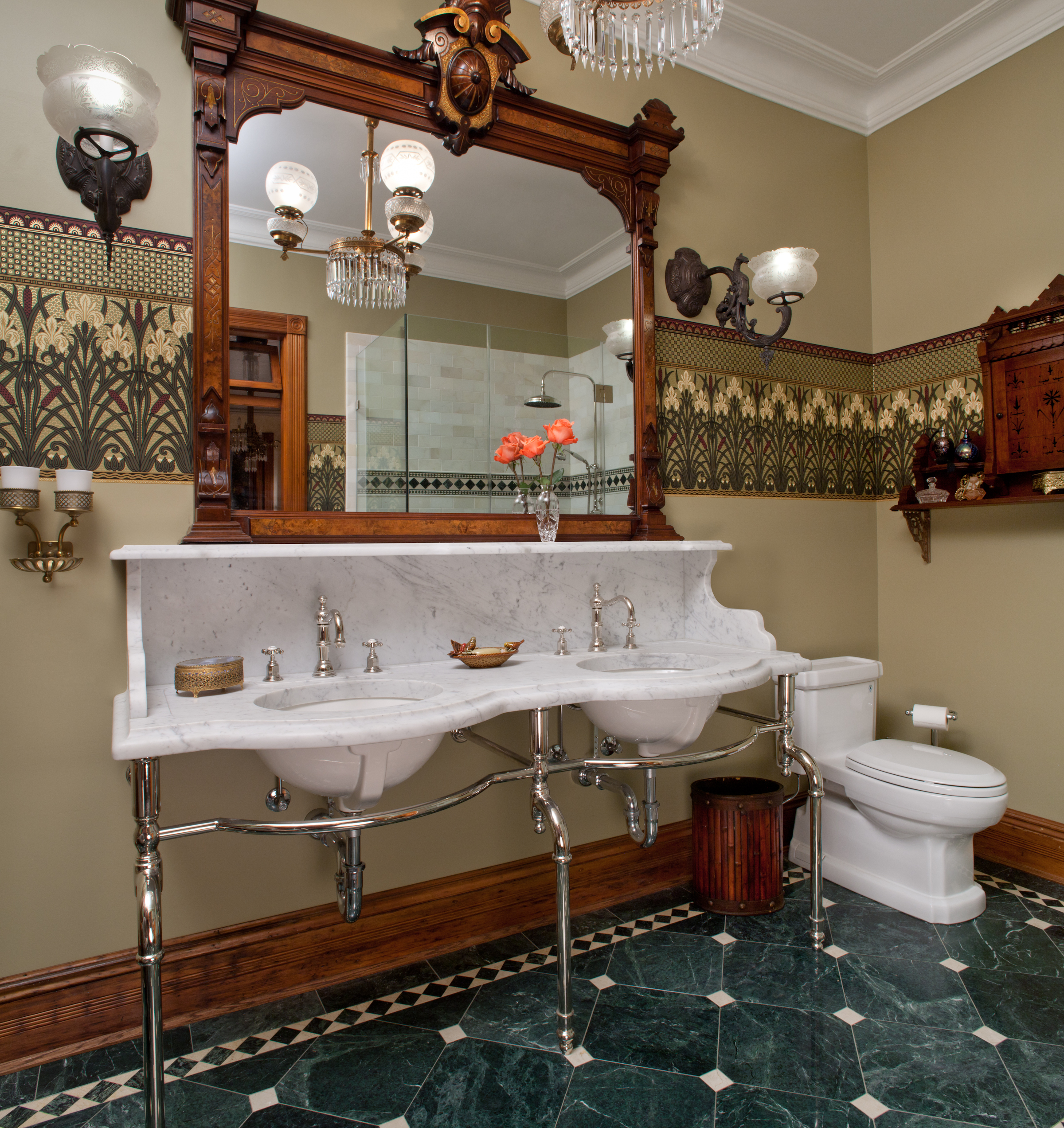Traditional historic bathroom with dual marble sinks