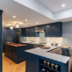 Breakfast Nook with Textured Blue Wallpaper Behind