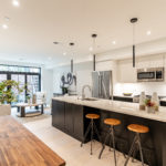 Modern Black and White Kitchen with Industrial Accents